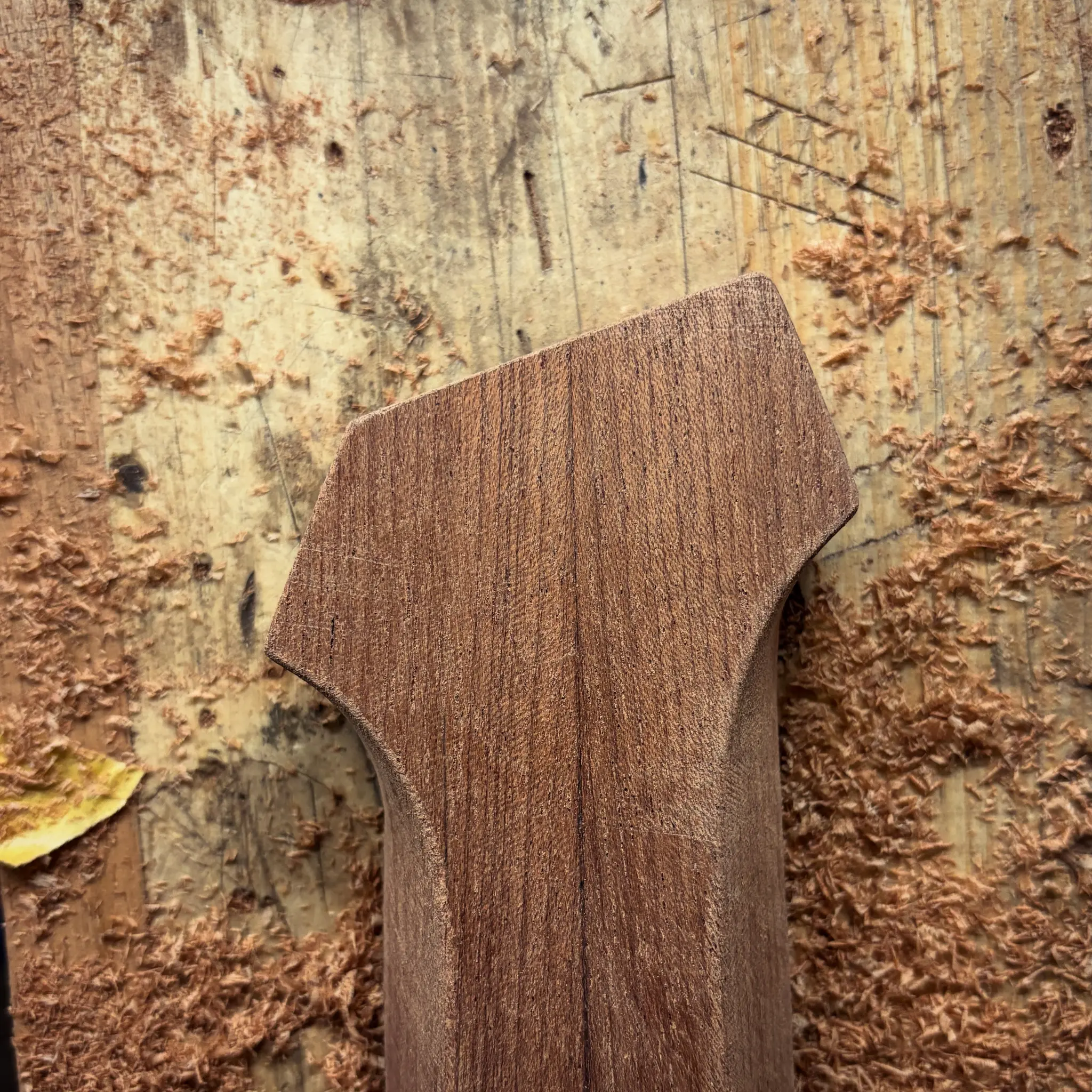 Headless guitar body in workshop
